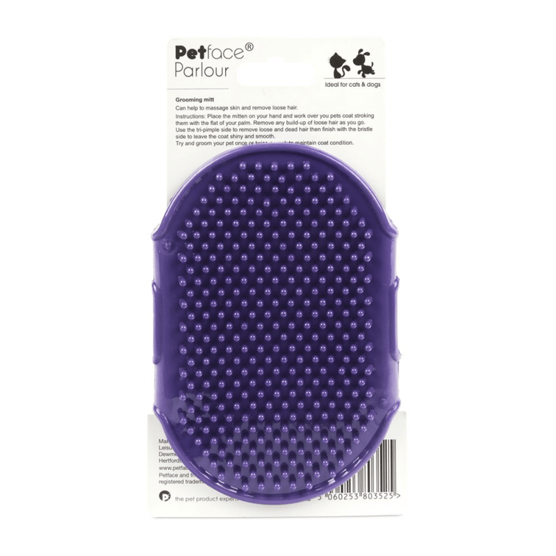 Purple rubber grooming mitt, packed on a cardboard sleeve on a white background. 