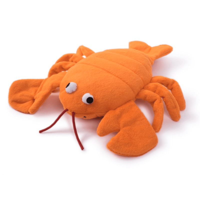 Orange plush dog toy on a white background.