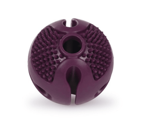 White background with a purple Petface Rubber Treat Ball Dog Toy. 