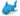 Bright blue plush shark dog toy with a white belly and yellow felt teeth on a white back ground. 