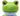 Close up of green frog plush dog toy with a blue underside and red eyes on a white background. 