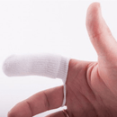 White background with a hand wearing a white Petosan Microfibre finger cloth Oral Cleaner for pets on the index finger. 