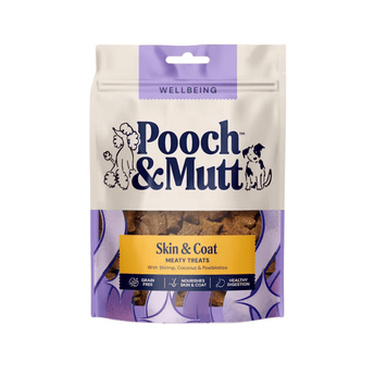A pouch of Pooch & Mutt Skin & Coat Meaty Treats for dogs, featuring a cream-colored upper section with the brand logo, a yellow label, and a purple lower section showing the treats inside.