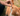 Ginger and white cat being given a PlaqueOff Dental bite. 
