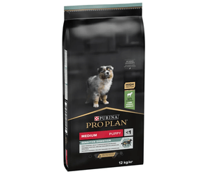 White background with a black bag of Purina Pro Plan Medium Puppy Sensitive Digestion. Pictured on the bag is an collie puppy. 