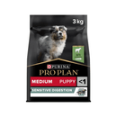 White background with a black bag of Purina Pro Plan Medium Puppy Sensitive Digestion. Pictured on the bag is an collie puppy. 