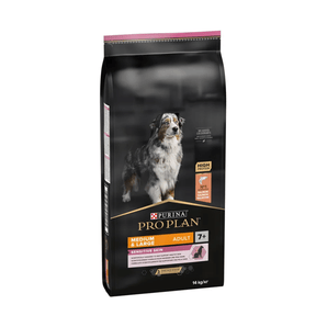 White background with a black bag of Purina Pro Plan Medium/Large Sensitive Skin dry food. Pictured on the bag is an adult tri-coloured collie dog. 