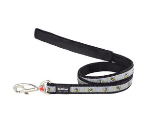 White background with a black 'Red Dingo' dog lead with bees pictured on it. 