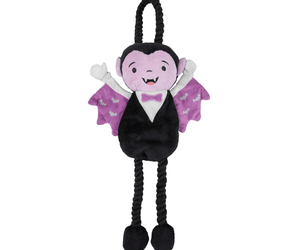 A Rosewood Van the Vampire plush dog toy with long black braided legs and a black-and-purple body, shown on a plain white background.