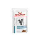 White background with a pouch of wet cat food with an long haired tabby cat pictured on the packet, text on the pouch says 'Royal Canin Veterinary, Skin & Coat, Thin slices in gravy.'