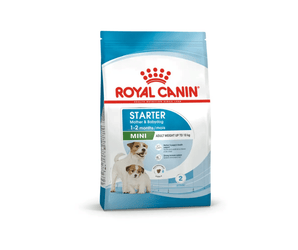 White background with a blue bag of Royal Canin Mother & Babydog. Pictured on the bag is an adult Jack Russell Terrier and a puppy, text on the bag states  '1-2months, Mini, Adult weight up to 10kg'. 