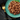 Black background with a teal bowl of Sheba select slices beef and turkey wet food in gravy pictured.