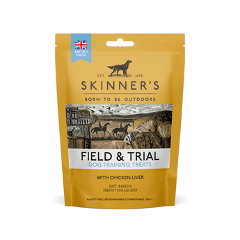 A package of Skinner's Field & Trial dog training treats, featuring a mustard yellow pouch with a central illustration of a hunting scene and a blue 'British Made' badge.