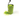 A side view of a green cylindrical caterpillar rattle roll toy with black antennae, a white-and-green gingham belly patch, brown polka dots for feet, and a fluffy lime-green tail, photographed on a white background.