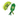 A plush cat toy set shaped like green peas in pods, photographed on a plain white background. One pod is open, showing three smiling pea characters inside, and the other is closed with a smiling pea face on the pod and ribbon-like stems below.