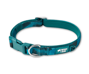 White background with a teal coloured Twiggy Tags Lagoon Adventure dog collar with a clip and d-ring with a tag with text 'Twiggy Tags'.