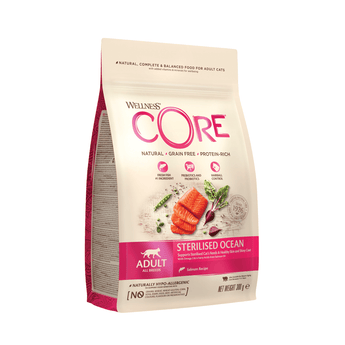 White background with a picture of a bag of Wellness CORE Sterilised Cat Food. On the bag is pictures of Salmon fillet, peas and a beet. The text on the bag 'Wellness CORE, Natural, Grain Free, Protein-Rich' and 'Adult, All breeds, Sterilised Ocean, Salmon Recipe'. 