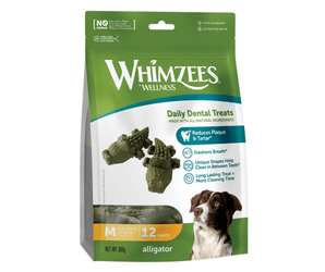 White background with a green and white bag of Whimzeez Dental Alligator Treats with a collie dog pictured on the packet.