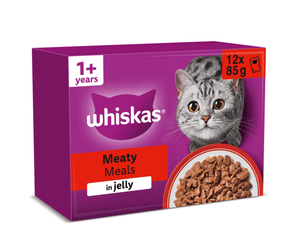 White background with a purple box of Whiskas Meaty Meals, on the box is silver tabby cat in front of a bowl on food. Text on the pack reads 'Whiskas, 1+ years, Meaty Meals, in Jelly, 12x85g'