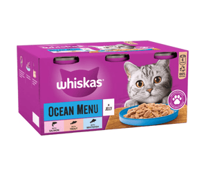 White background with a purple box of Whiskas Ocean Menu, on the box is silver tabby cat in front of a bowl on food. Text on the pack reads 'Whiskas, Ocean Menu in Jelly'.