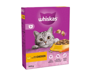 White background with a purple box of Whiskas Chicken dry food, on the box is silver tabby cat in front of a bowl on food. Text on the box reads 'Whiskas, 1+ years,  with delicious chicken, 300g'.