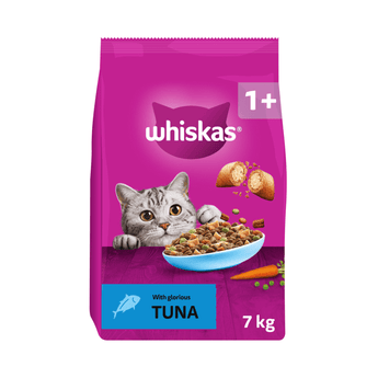 White background with a purple bag of Whiskas Tuna dry food, on the bag is silver tabby cat in front of a bowl on food. Text on the bag reads 'Whiskas, 1+ years,  with glorious tuna, 7kg'.