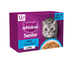 White background with a purple box of Whiskas Fish Favourites, on the box is silver tabby cat in front of a bowl on food. Text on the pack reads 'Whiskas, 11+ years, Fish Favourites, in Jelly, 12x85g'.