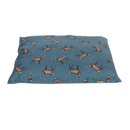 Front view of a pillow-type blue dog bed with illustrated stags pictured on a white background. 