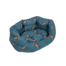 Bolster-type blue dog bed with illustrated stags pictured on a white background. 