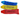 Three plush toy crayons, one blue, one red and one yellow. Pictured on a white background. 